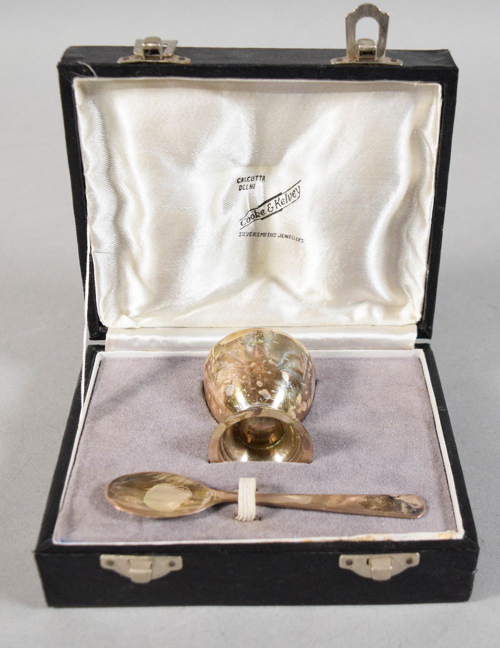 Lot 247: Indian Colonial Silver Salt Cellar and Spoon Set by Cooke and Kelvey