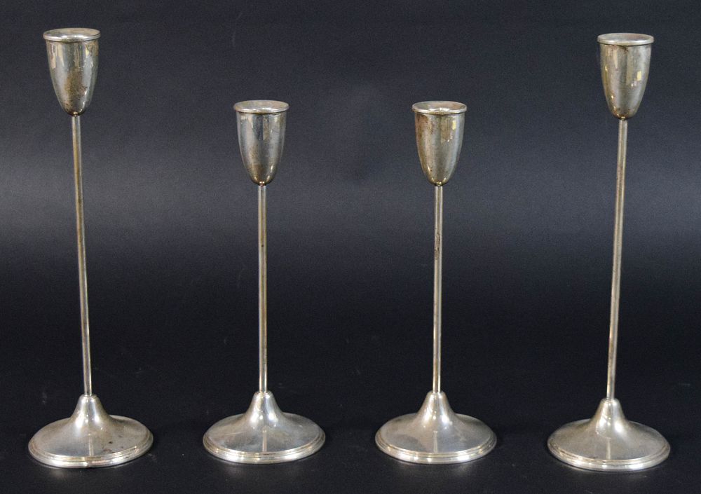 Lot 237: Set of 4 Empire Weighted Sterling Silver Candlesticks