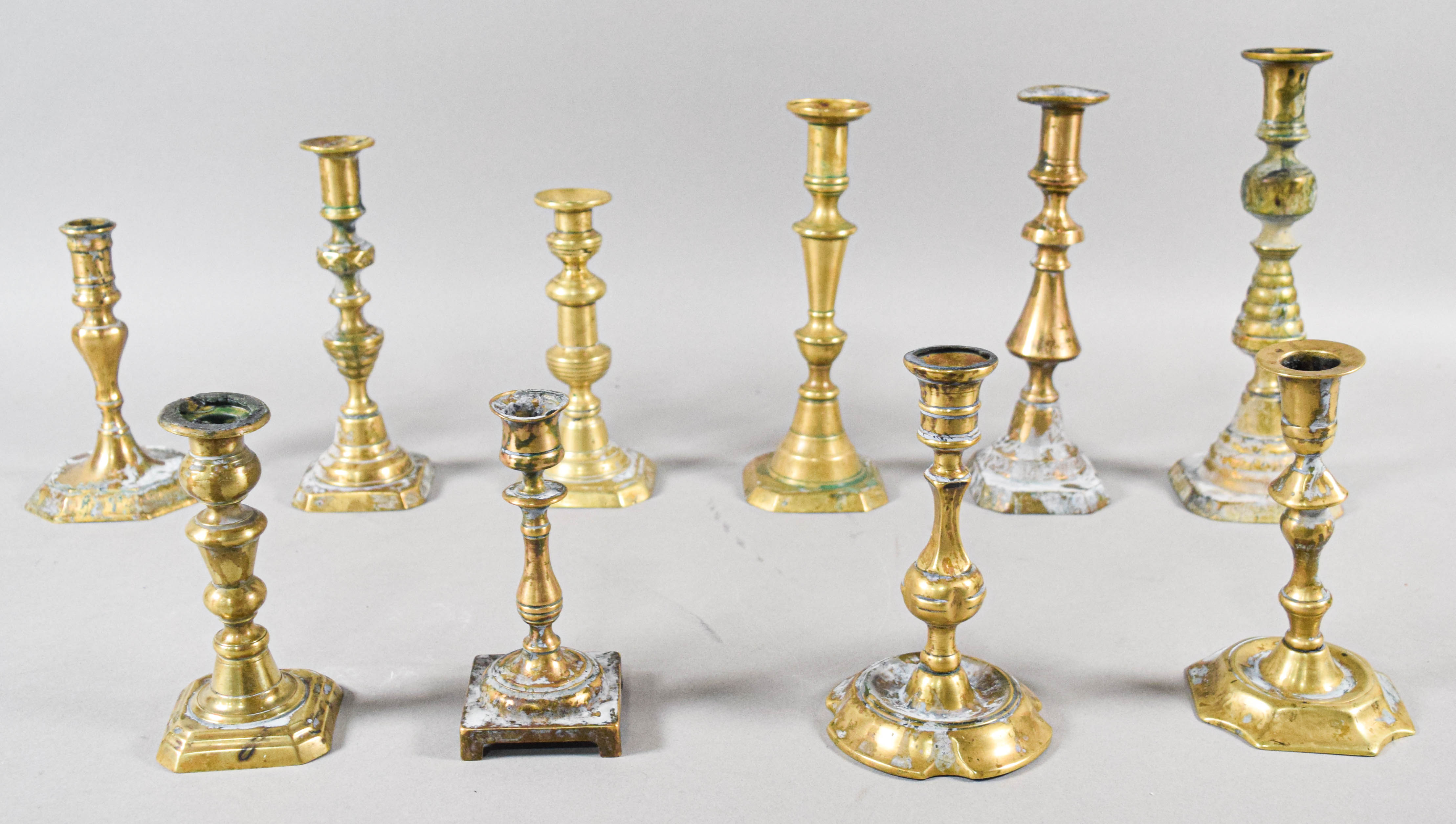 Collection of 10 Antique Turned Brass Candlesticks