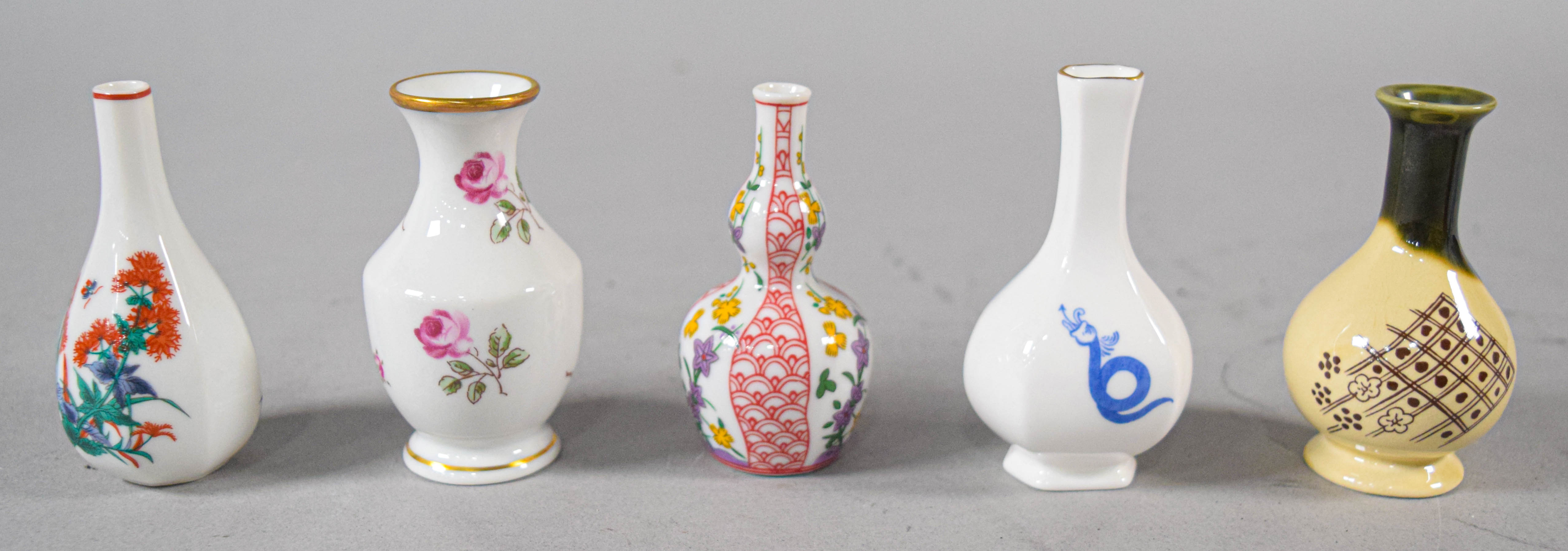 19 Miniature Vases in Porcelain and Carved Stone