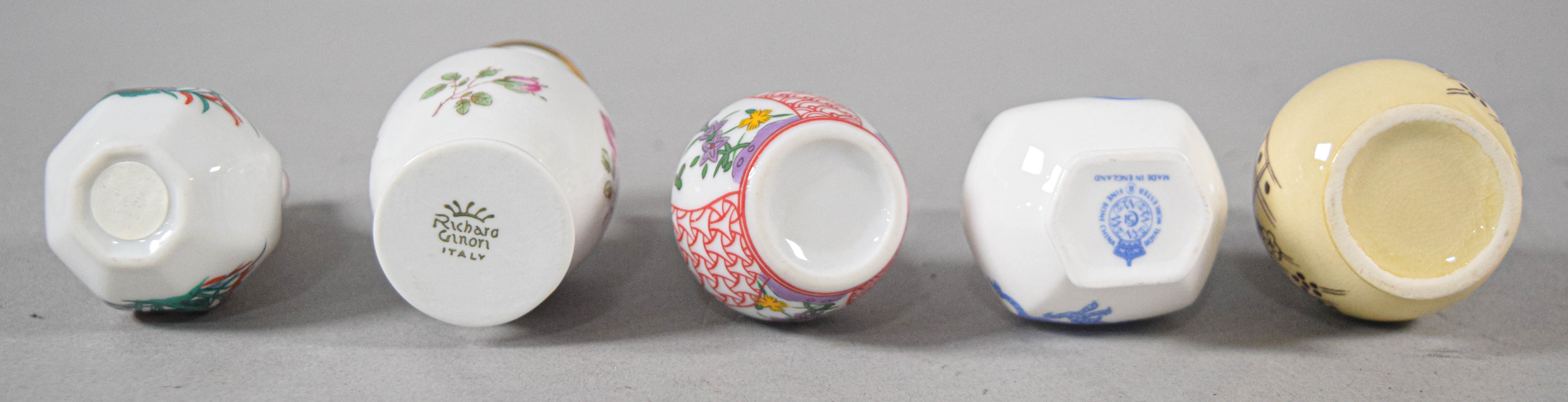 19 Miniature Vases in Porcelain and Carved Stone