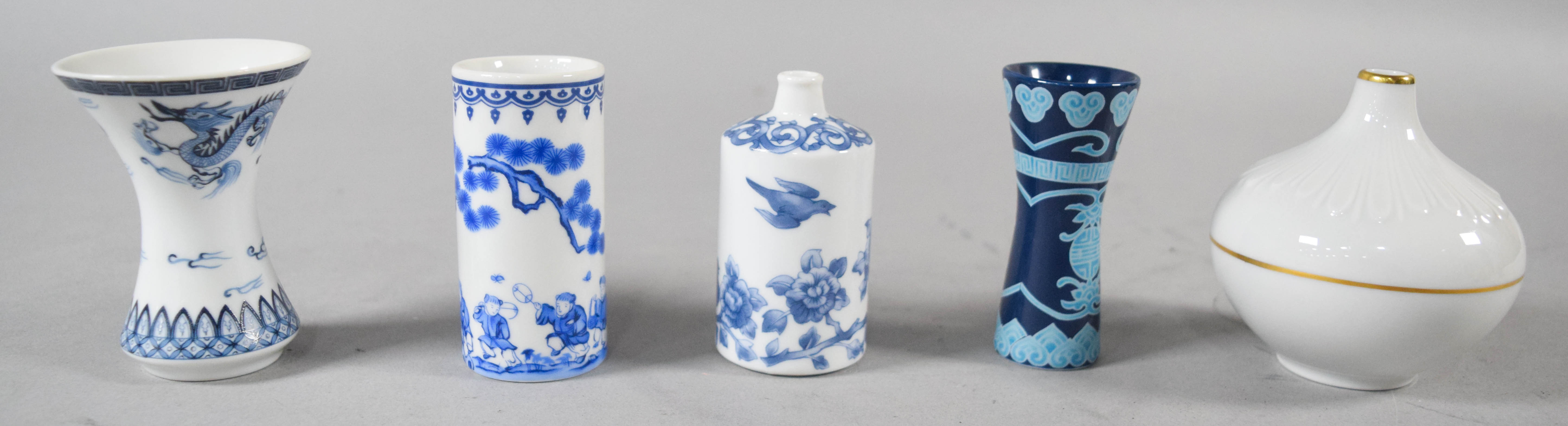19 Miniature Vases in Porcelain and Carved Stone