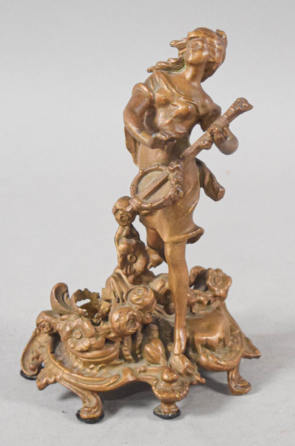 Lot 255: Art Nouveau Style Cast Metal Sculpture of a Woman Playing a Mandolin