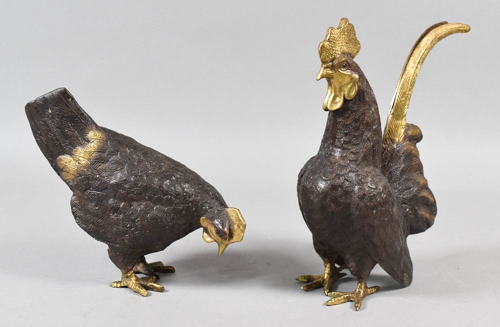 Lot 251: A Pair of Gilt Accented Patinated Bronze Roosters
