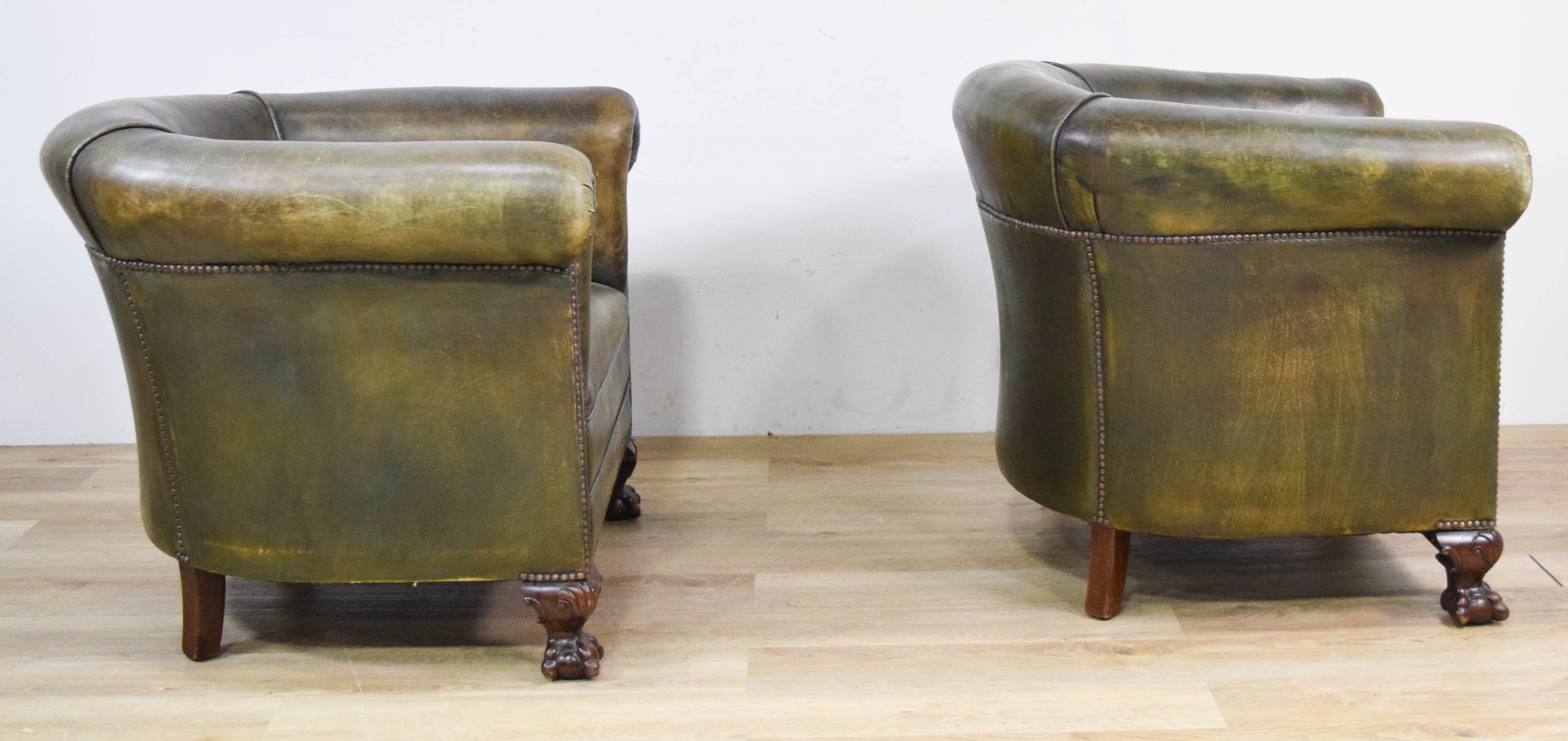 Pair of Green Leather Club Chairs with Ball and Claw Feet