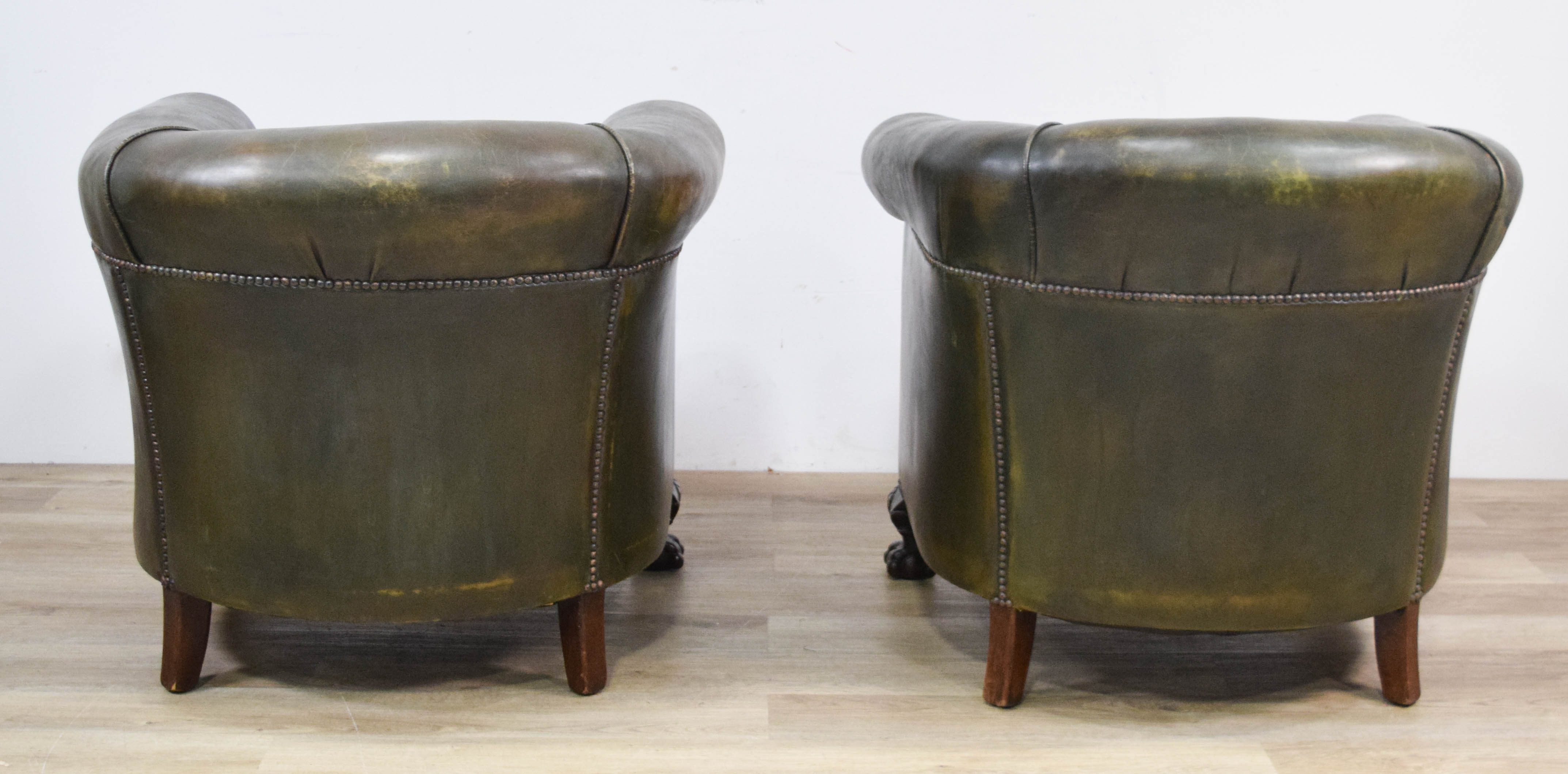 Pair of Green Leather Club Chairs with Ball and Claw Feet
