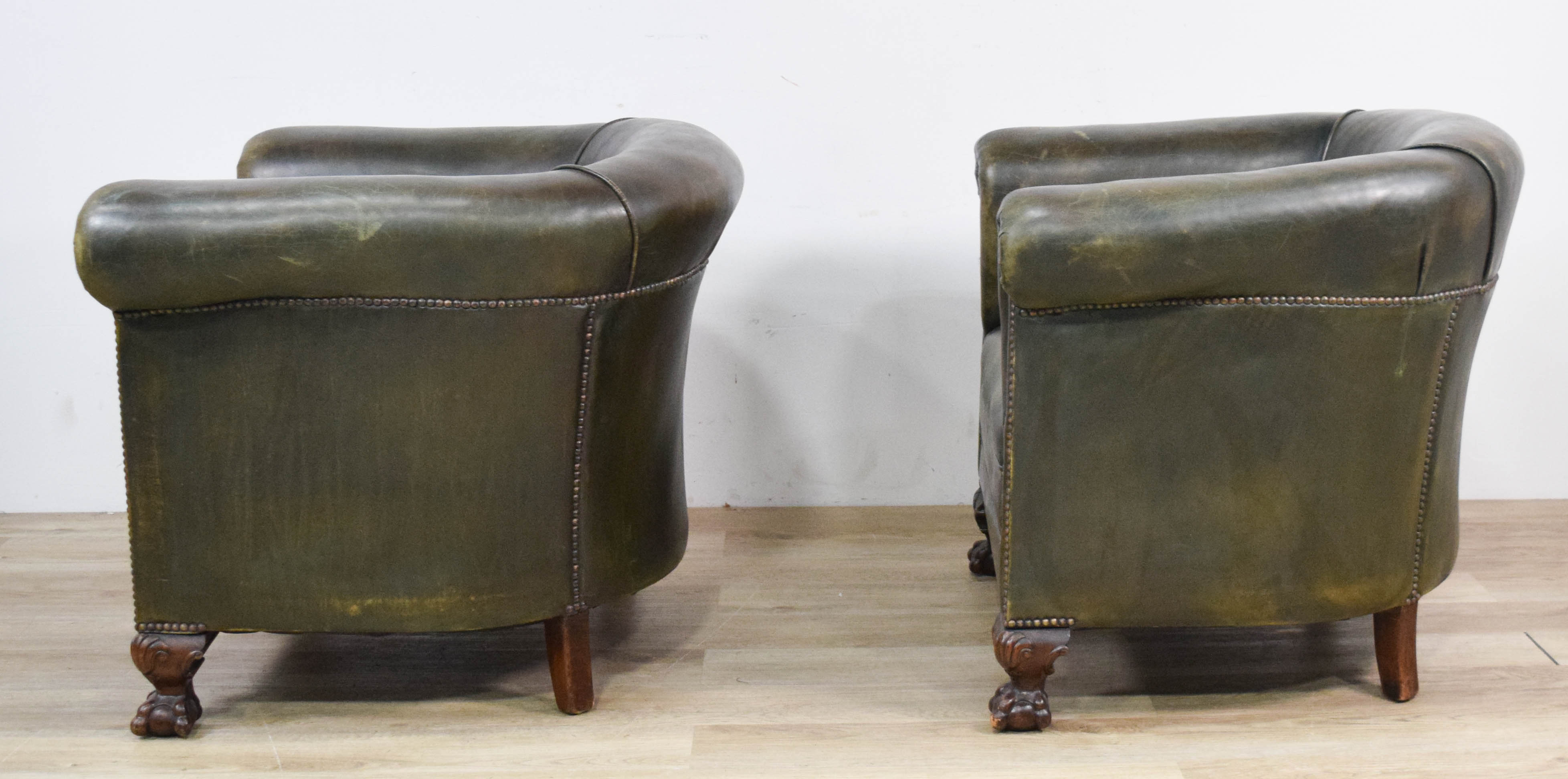 Pair of Green Leather Club Chairs with Ball and Claw Feet