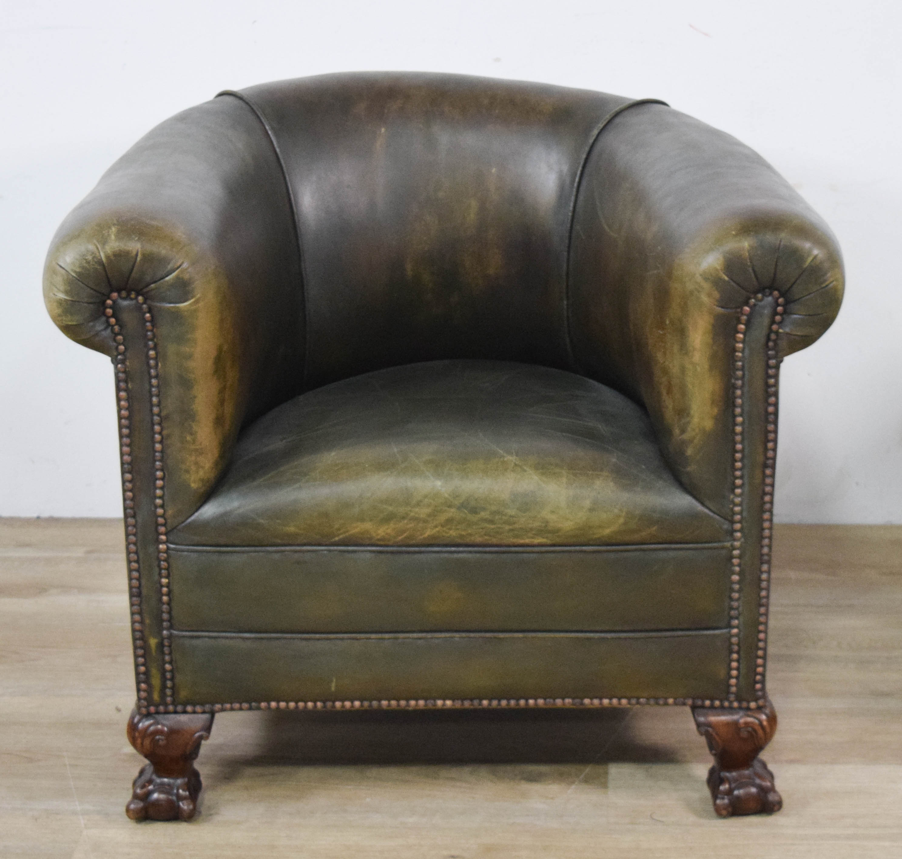 Pair of Green Leather Club Chairs with Ball and Claw Feet