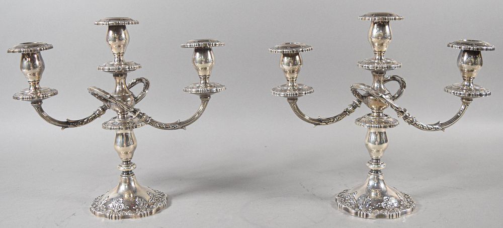 Lot 244: Pair of Fisher Weighted Sterling Three-Light Candelabra