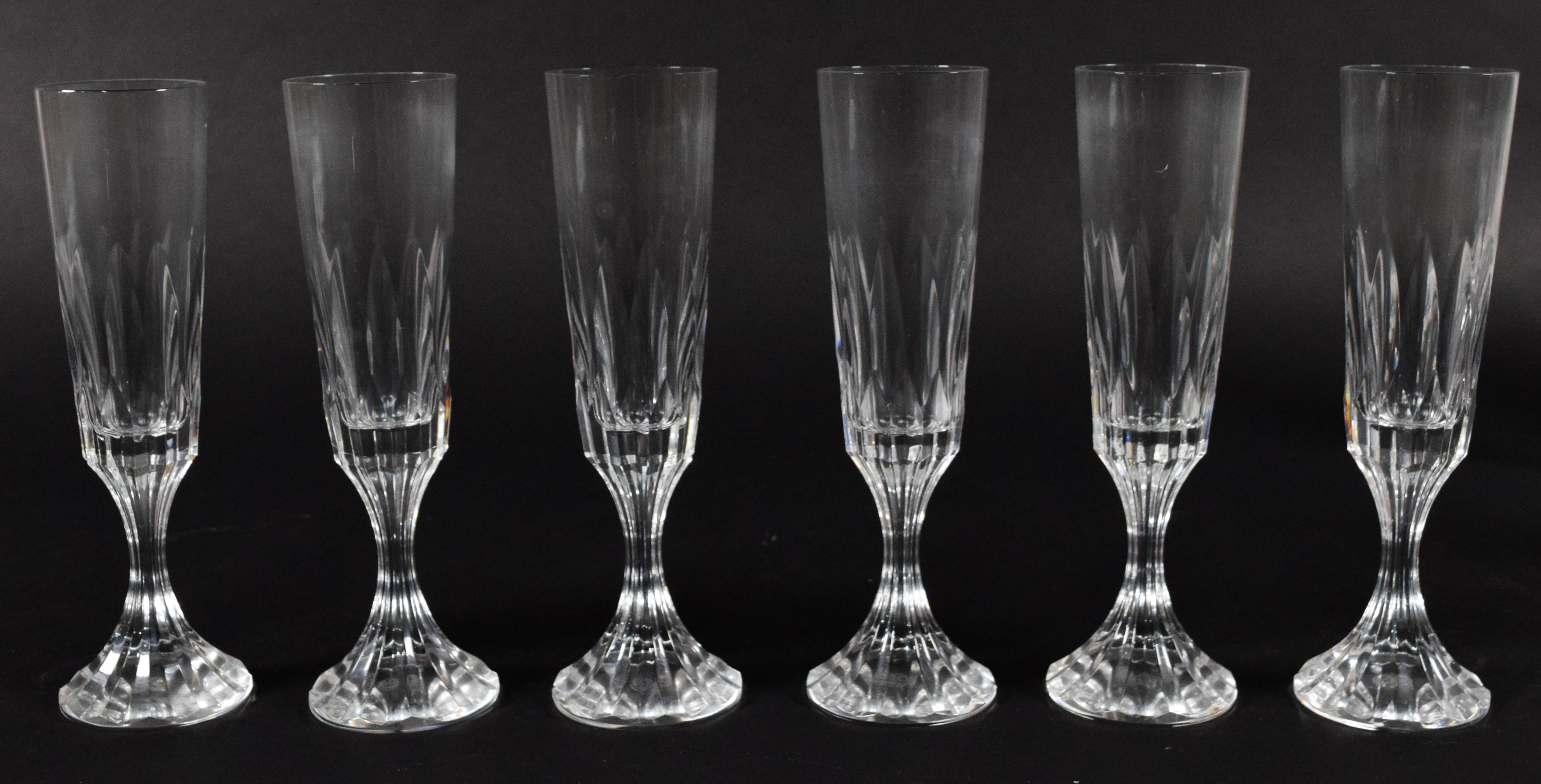 A Set of Twelve Baccarat D'Assas Pattern Crystal Champagne Flutes