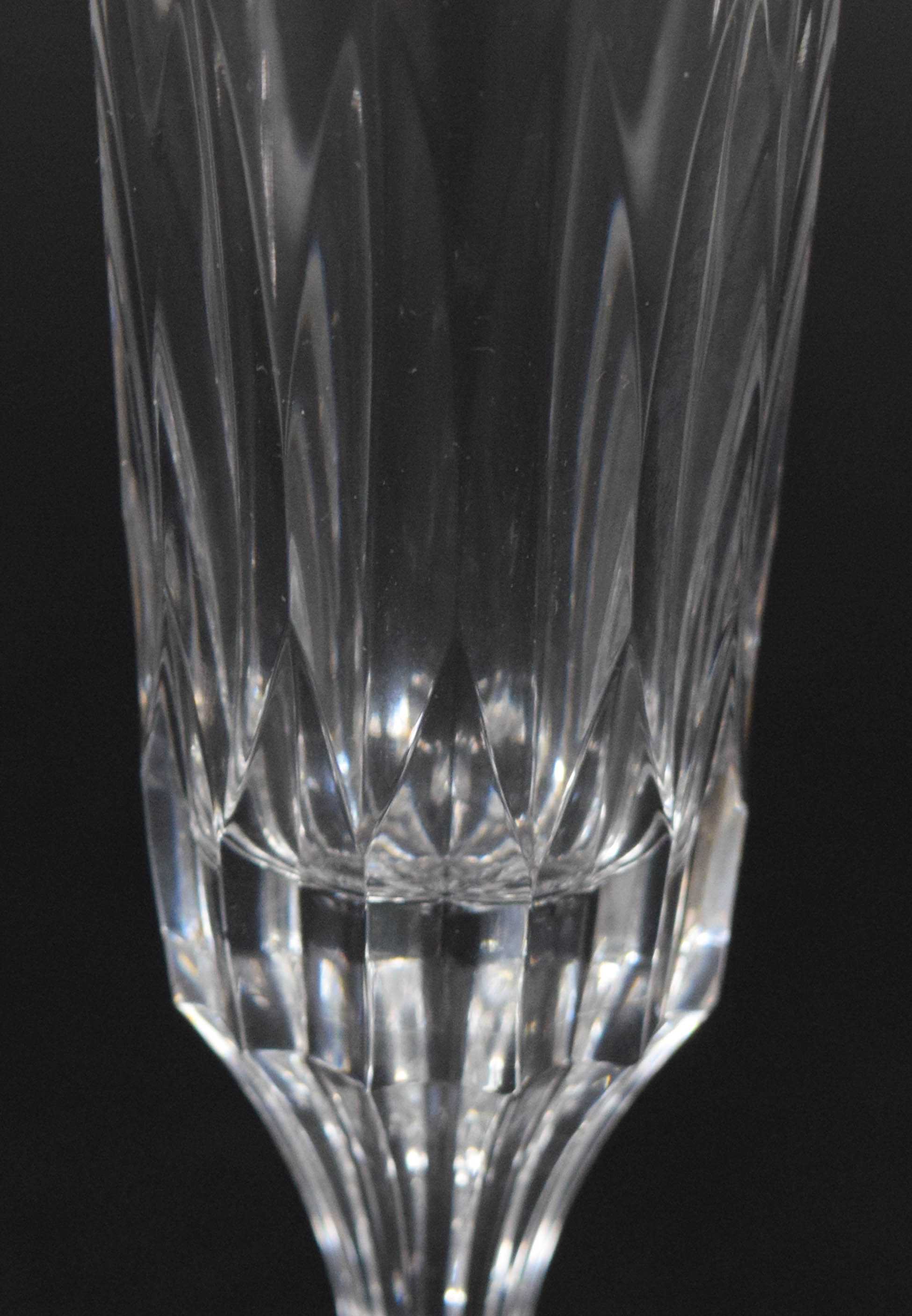 A Set of Twelve Baccarat D'Assas Pattern Crystal Champagne Flutes