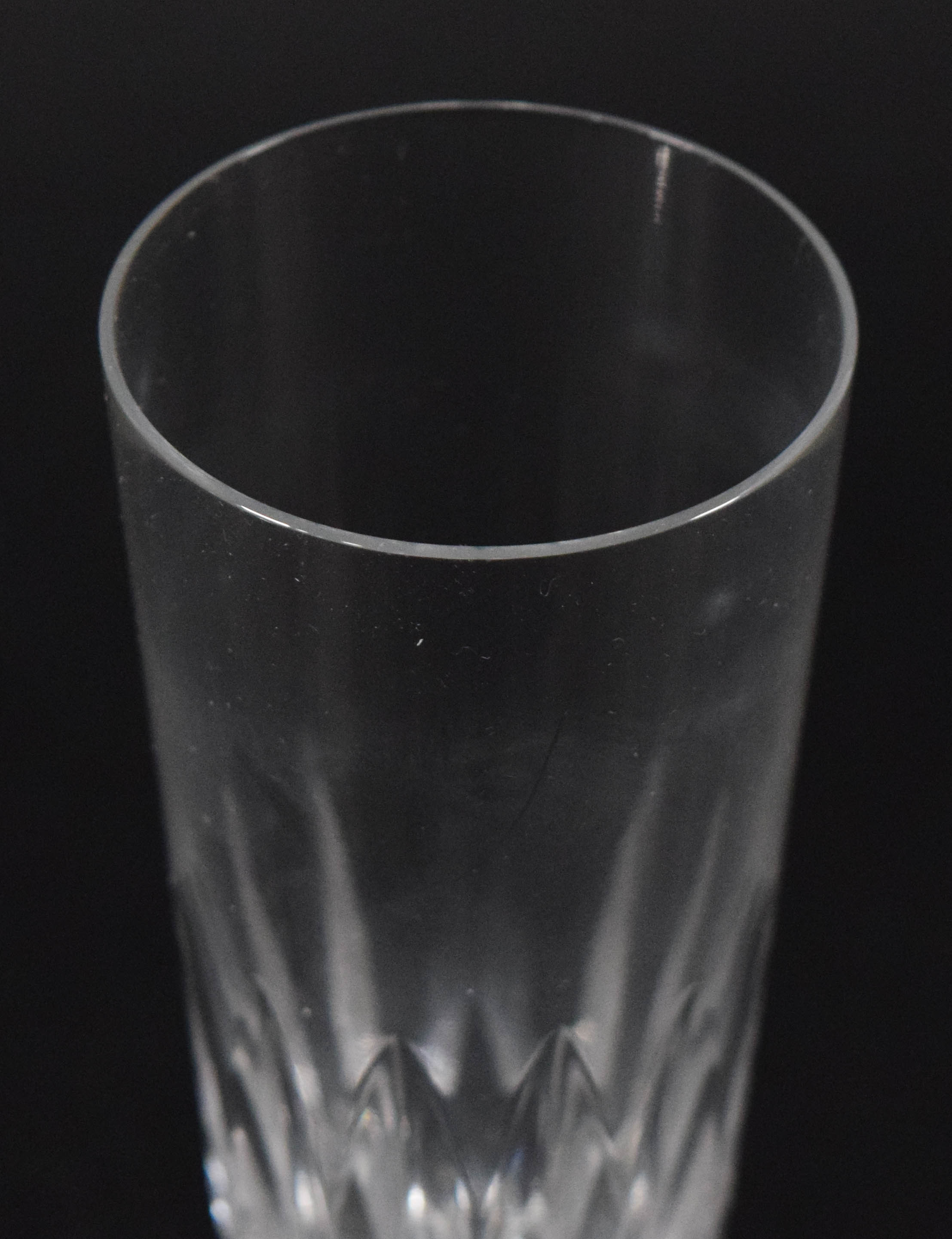 A Set of Twelve Baccarat D'Assas Pattern Crystal Champagne Flutes