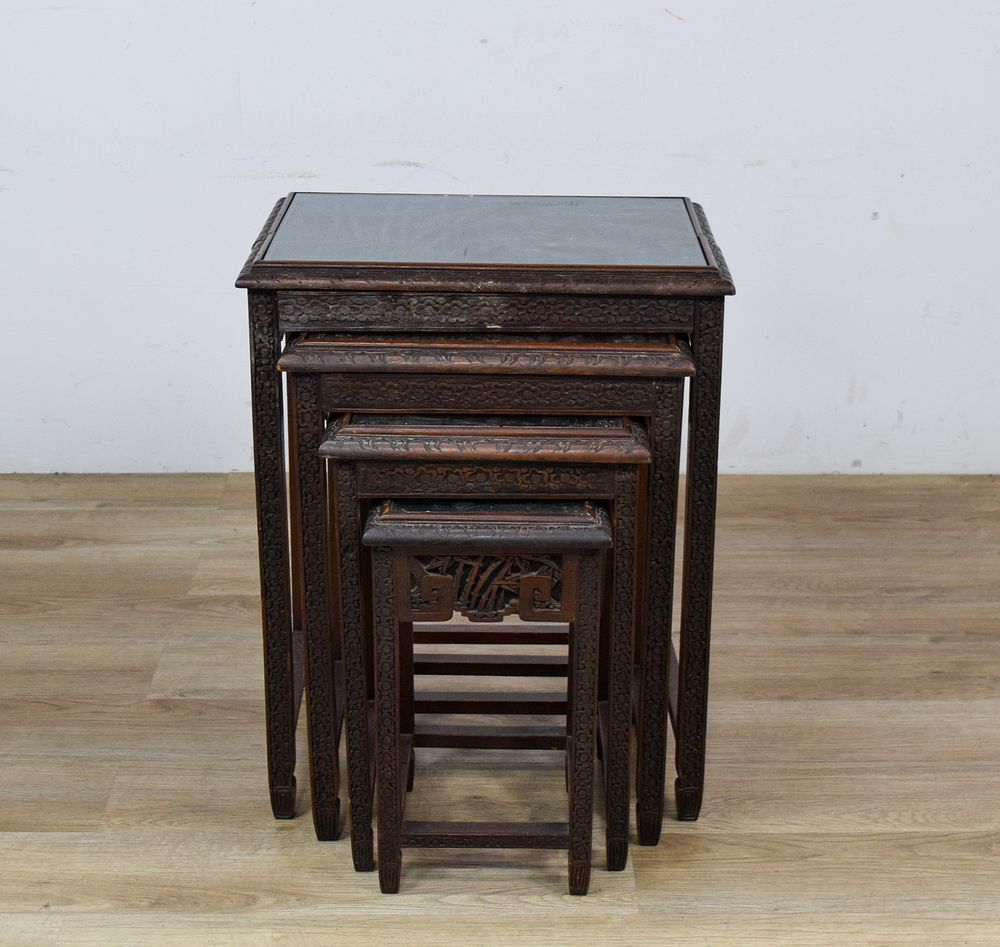 Lot 312: Set of 4 Chinese Carved Wood Nesting Tables with Inset Glass Tops