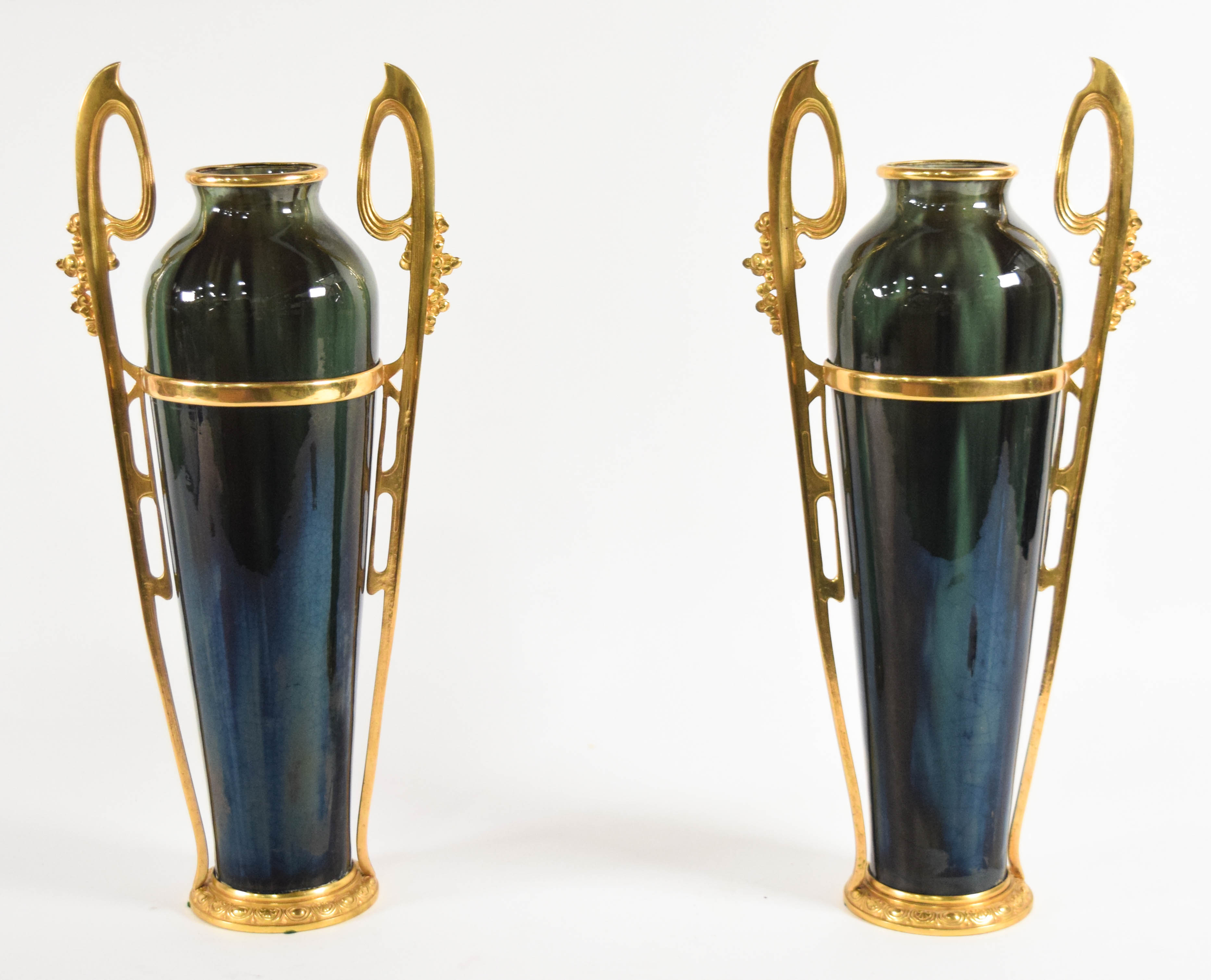 A Pair of Egyptian Revival Gilt Metal Mounted Glazed Ceramic Vases