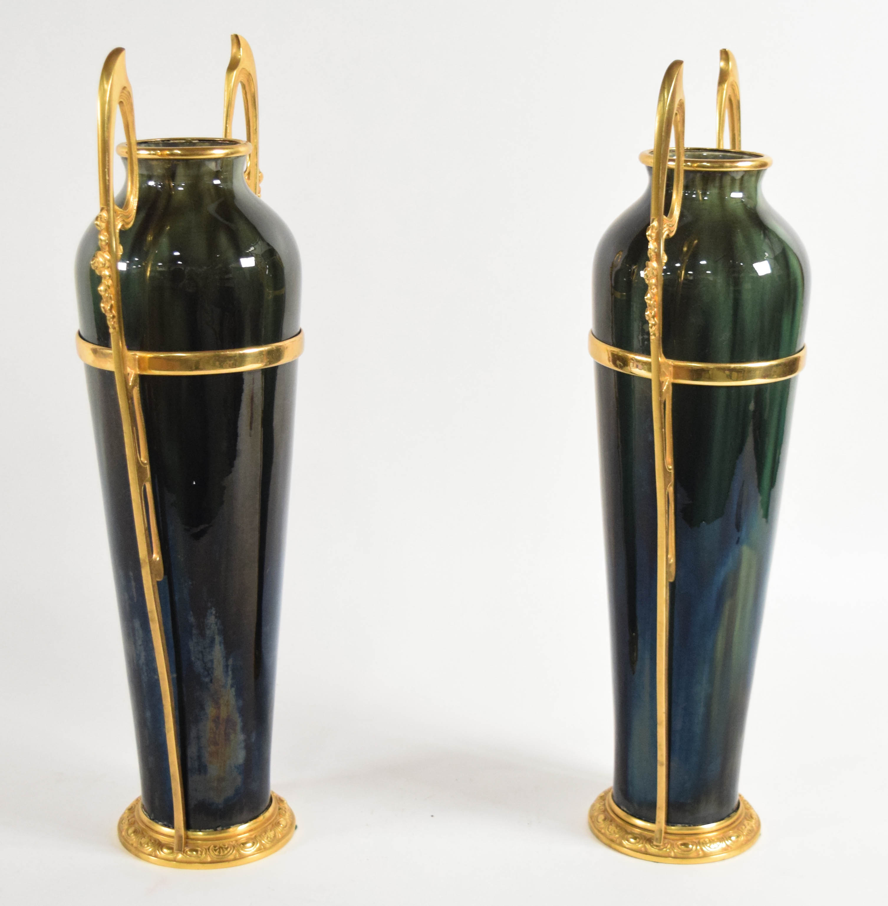 A Pair of Egyptian Revival Gilt Metal Mounted Glazed Ceramic Vases