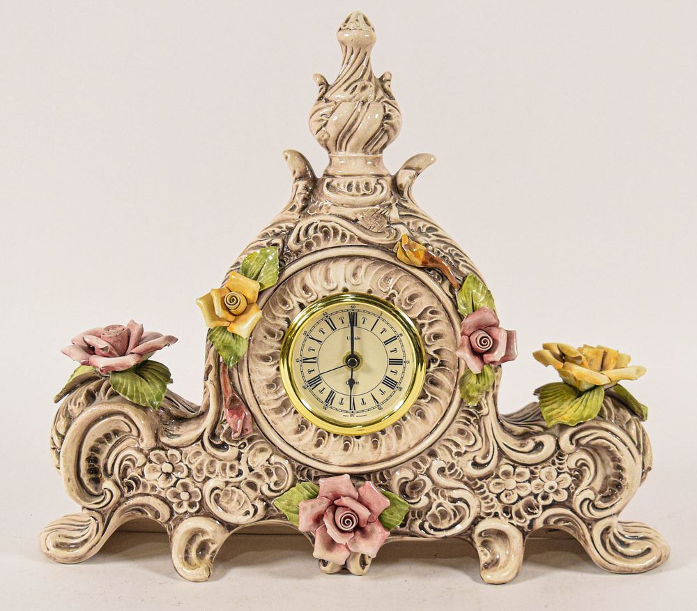 Lot 163: Large Porcelain Floral Encrusted Mantel Clock with Kienzle Quartz Movement