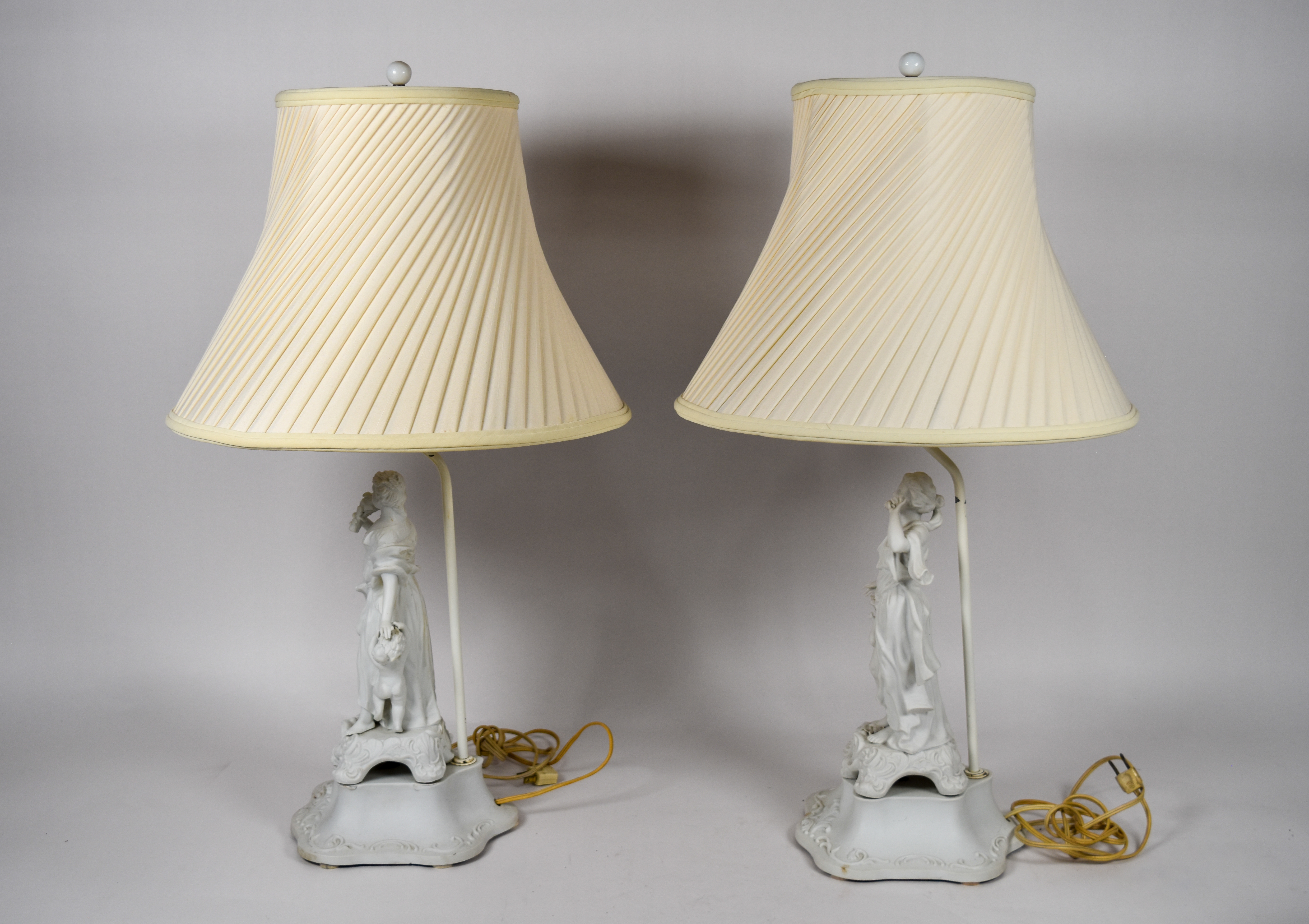 A Pair of Andrea by Sadek Neoclassical Bisque Porcelain Figural Table Lamps