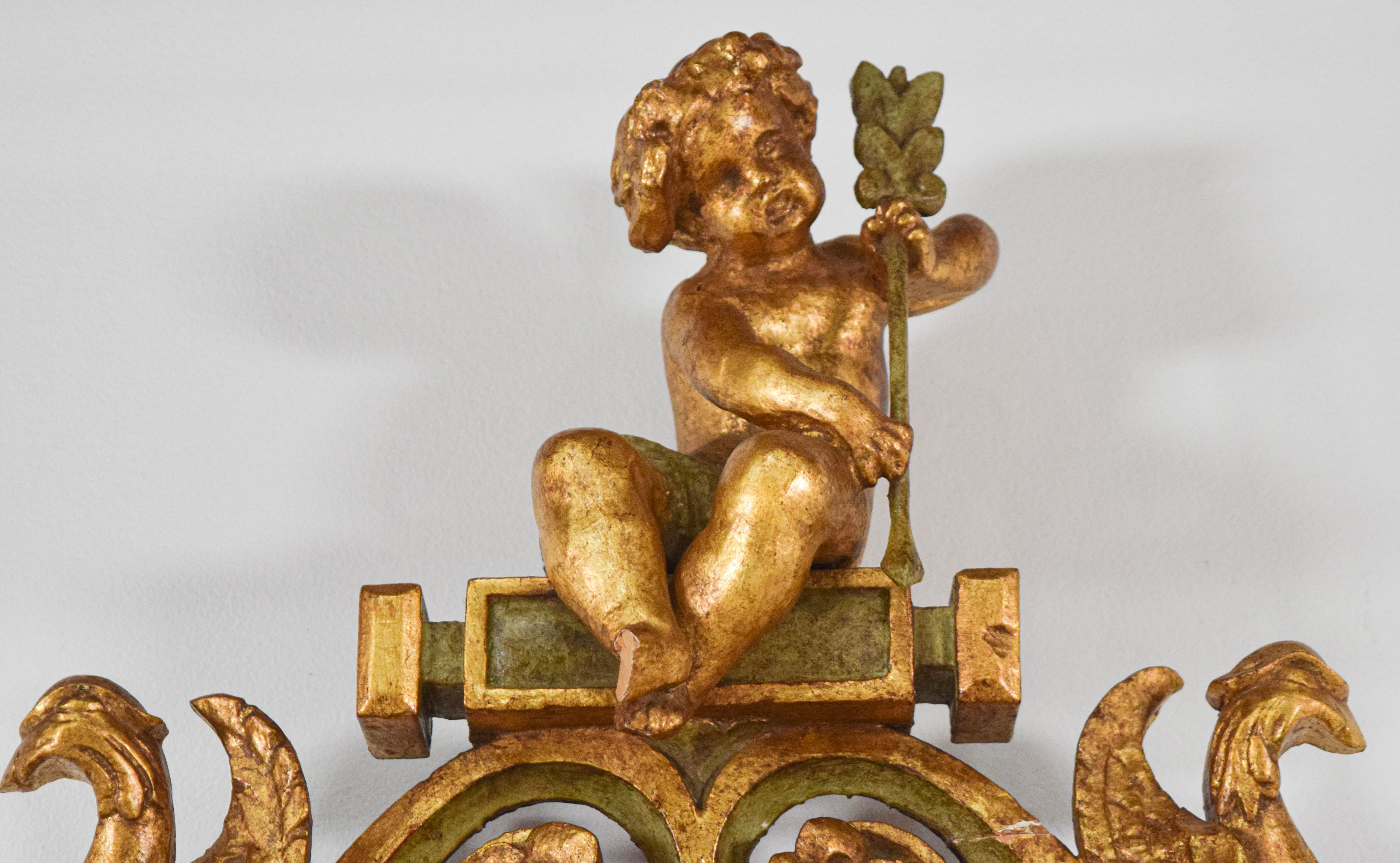 Rococo Revival Carved Giltwood Oval Wall Mirror with Cherubs and Birds
