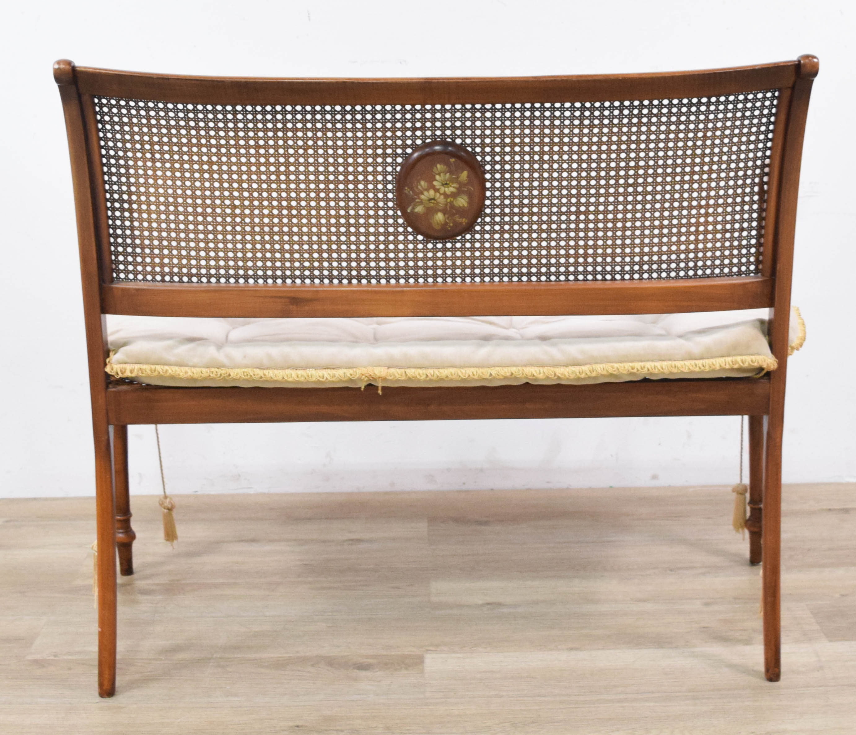 Regency Style Caned Wood Settee with Hand-Painted Floral Medallion