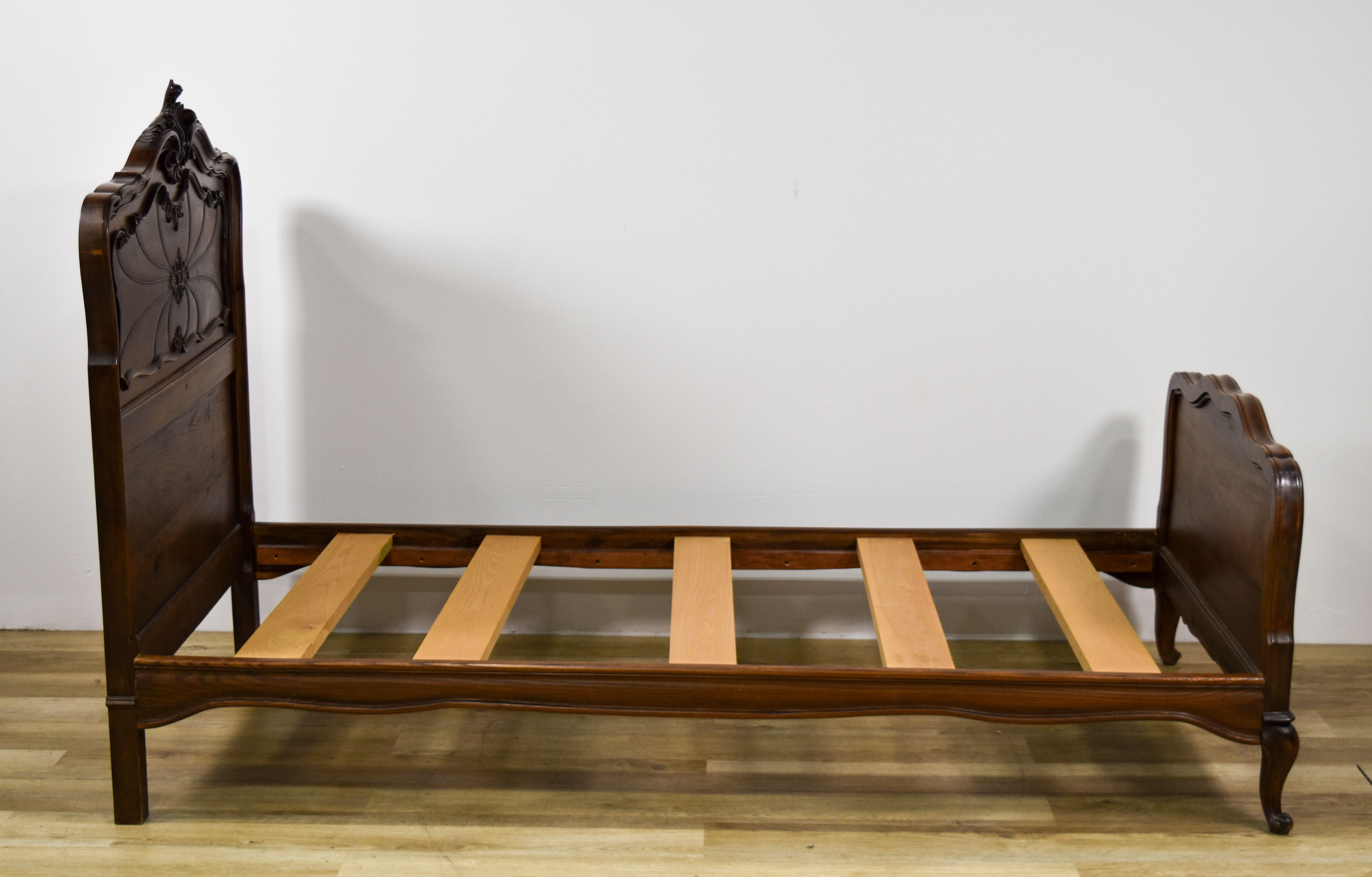 A Near Pair of Louis XV Style Twin Wood Bed Frames