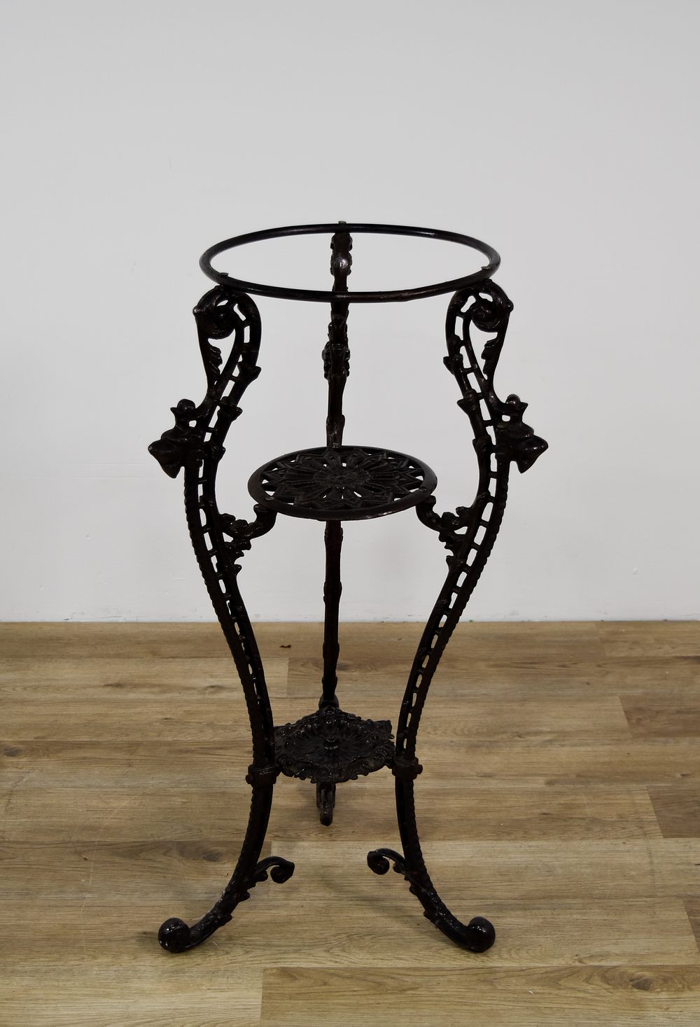 Lot 373: Victorian Style Three-Tier Cast Iron Plant Stand with Lion Head Motifs
