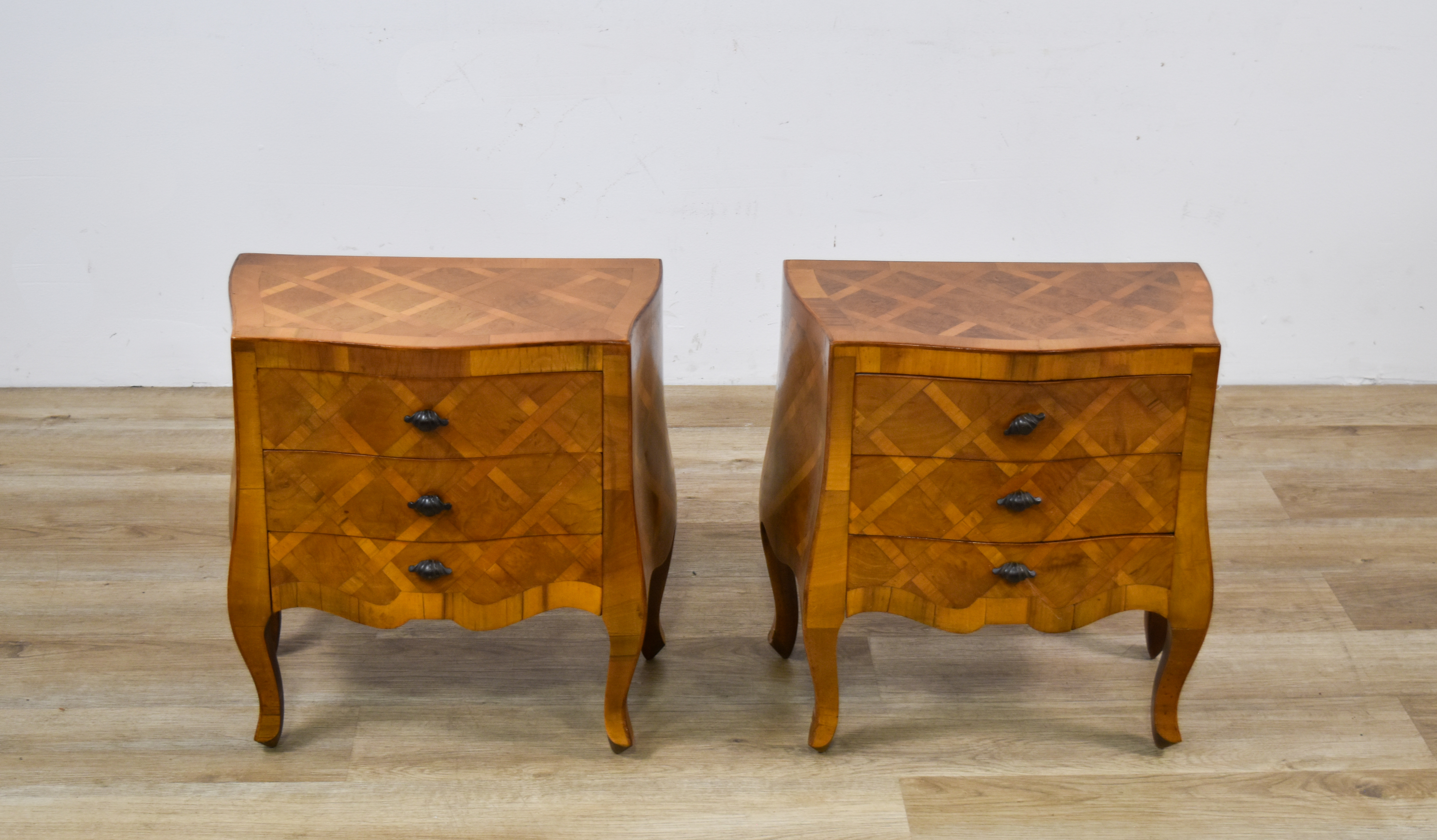A Pair of Italian Parquetry Bombe Commodes for W&J Sloane