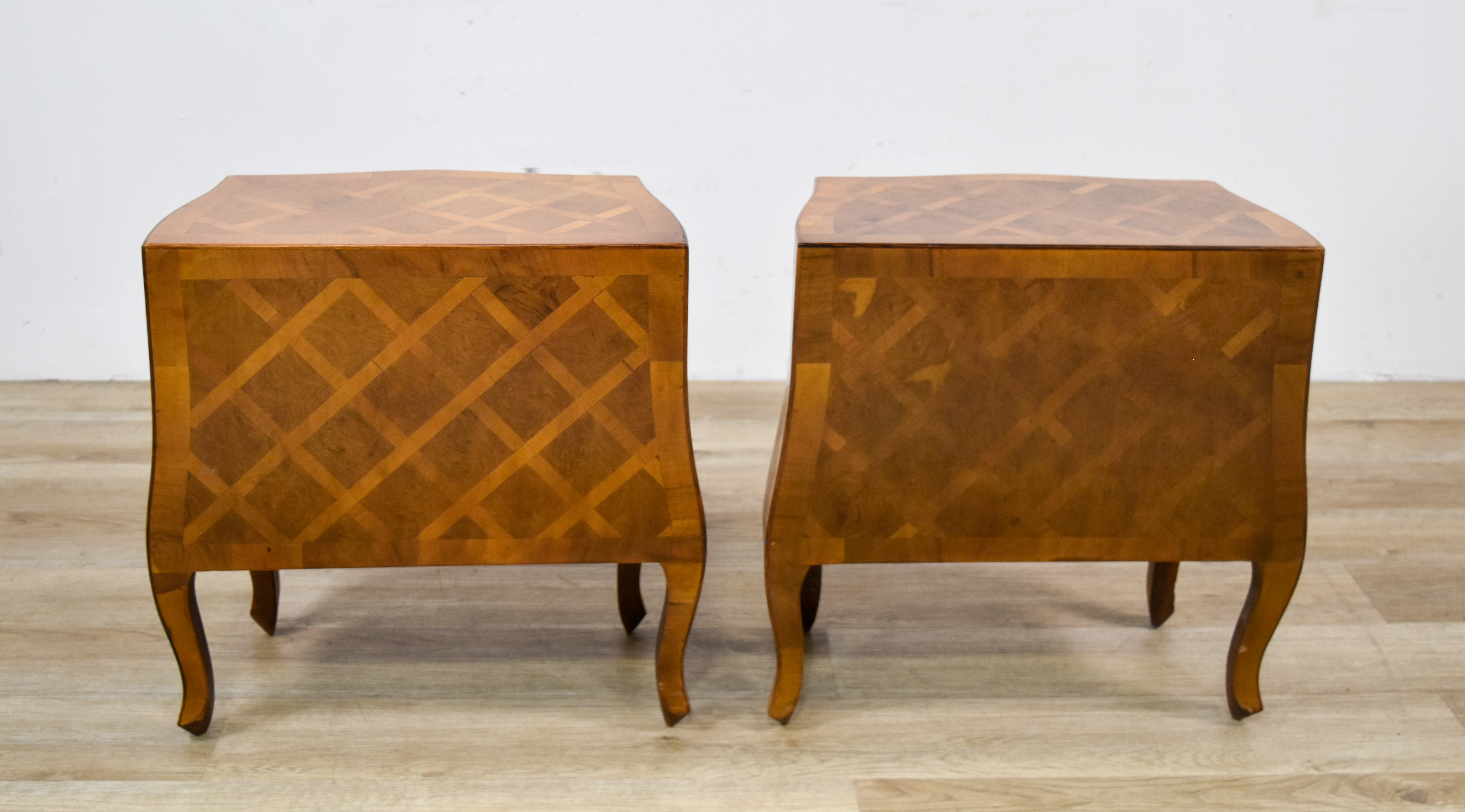 A Pair of Italian Parquetry Bombe Commodes for W&J Sloane