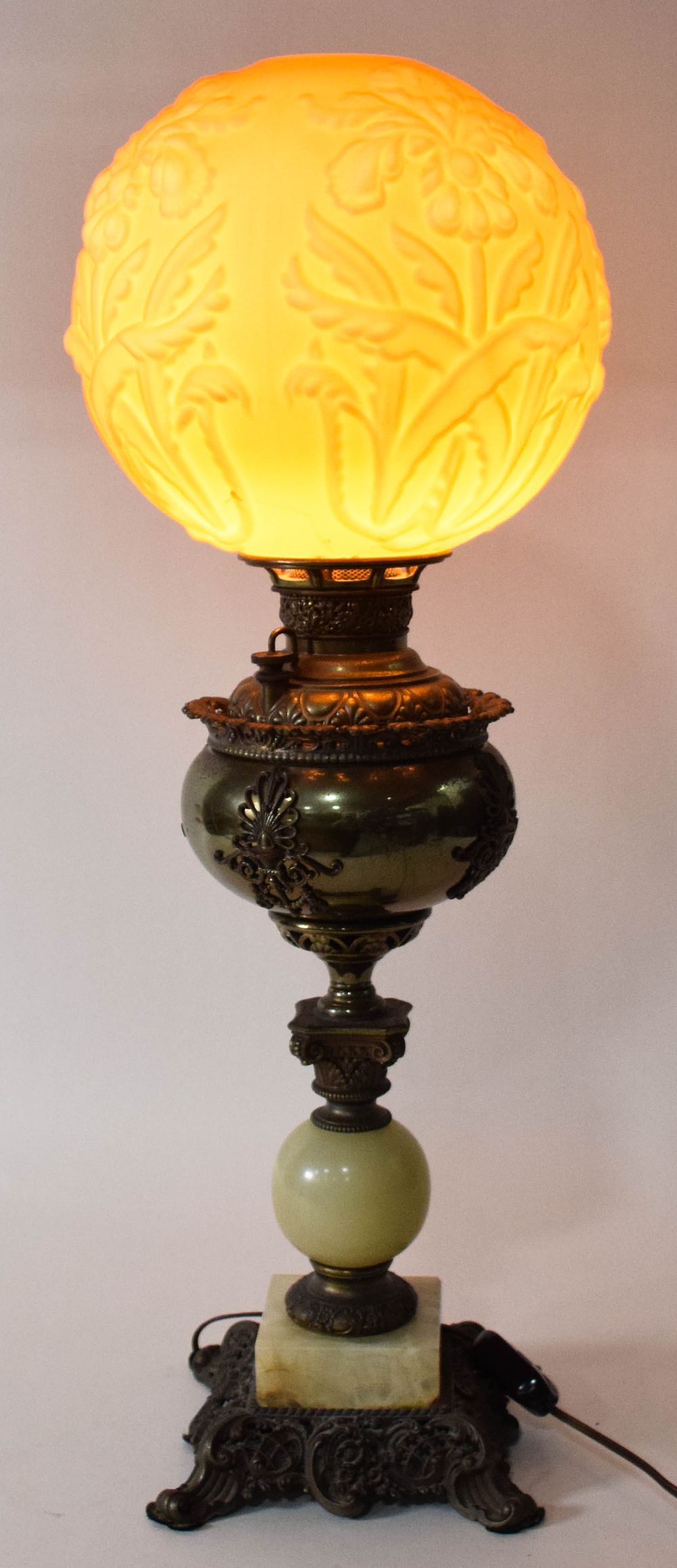 Lot 294: Victorian Electrified Parlor Lamp with Floral Relief Glass Shade and Onyx Elements