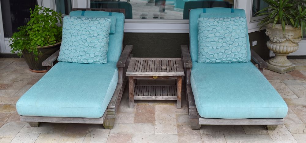 Lot 12948: Pair of Giati Teak Chaise Loungers and Barlow Tyrie Mission Side Table