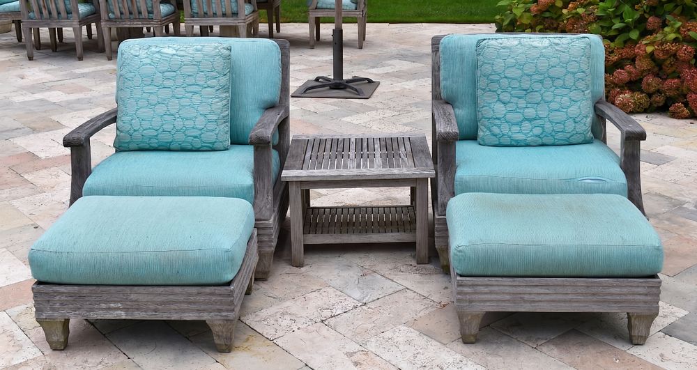 Lot 12951: Pair Of Giati Teak Club Chairs And Ottomans With Barlow Tyrie Side Table