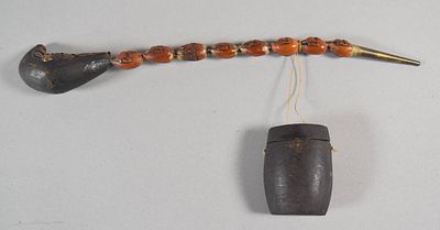 Japanese Carved Wood Opium Pipe with Matching Container. This Japanese opium pipe features a 