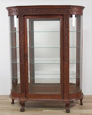 American Late Victorian Quartersawn Oak Bow-Front Curio Cabinet. American late Victorian 