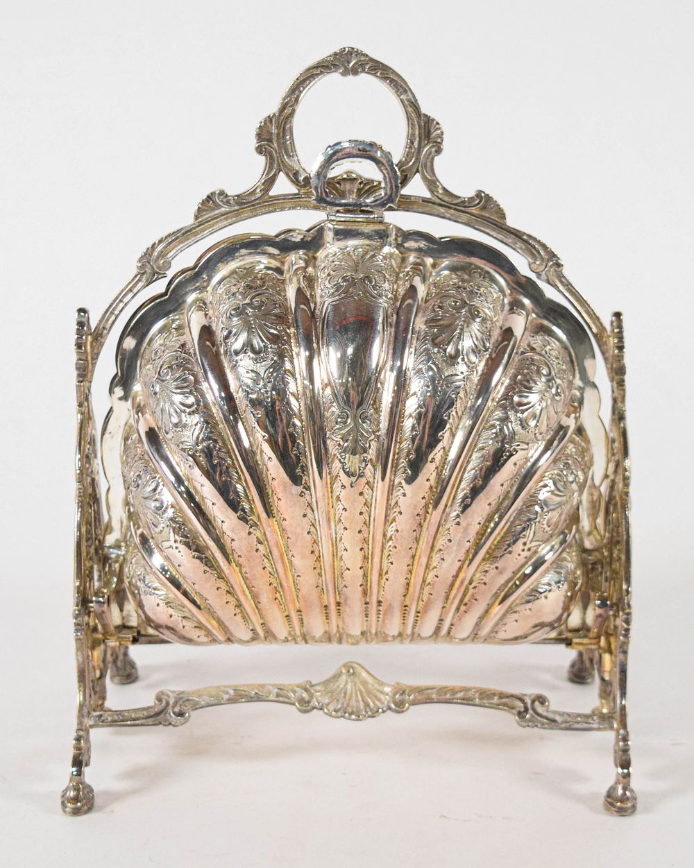 Lot 287: Mappin & Webb Victorian Silver-Plated Shell Form Biscuit Warmer