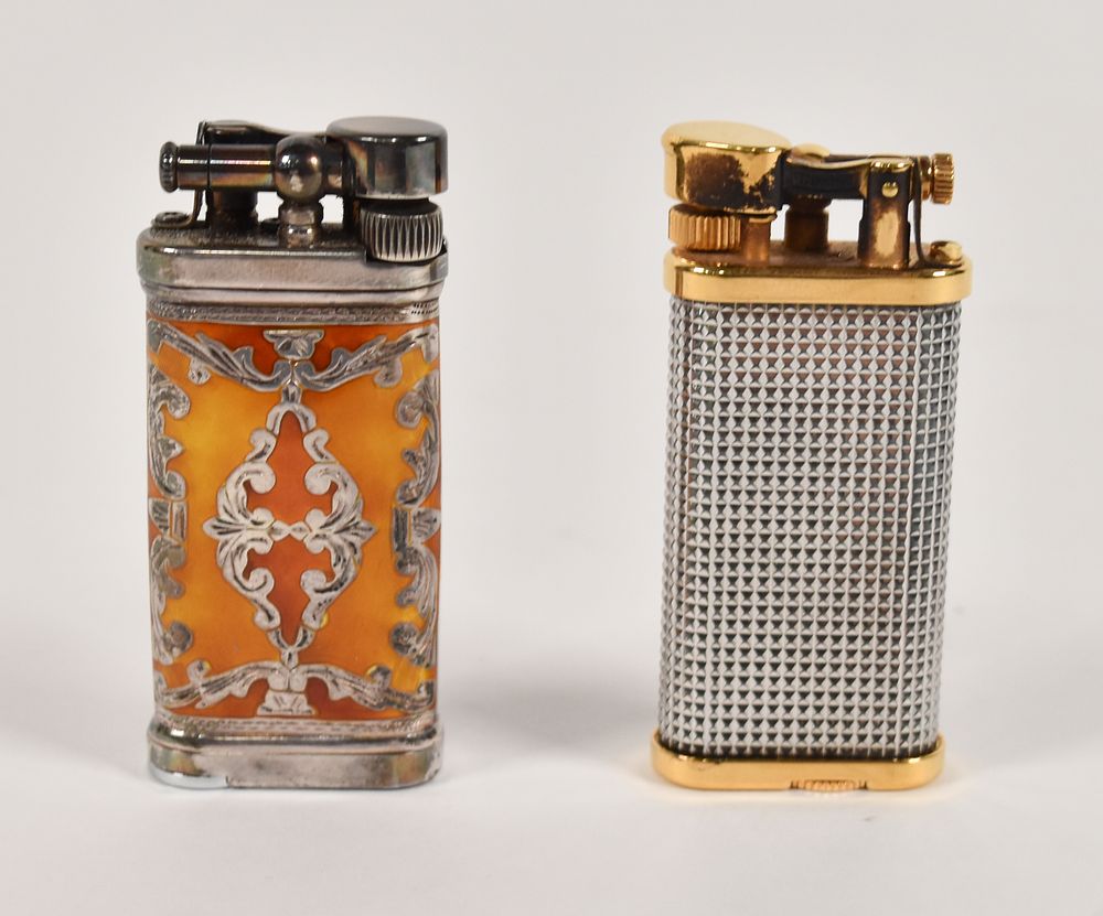 Lot 262: 2 Dunhill and IM Corona Sterling Silver and Silver-Plated Lift-Arm Lighters
