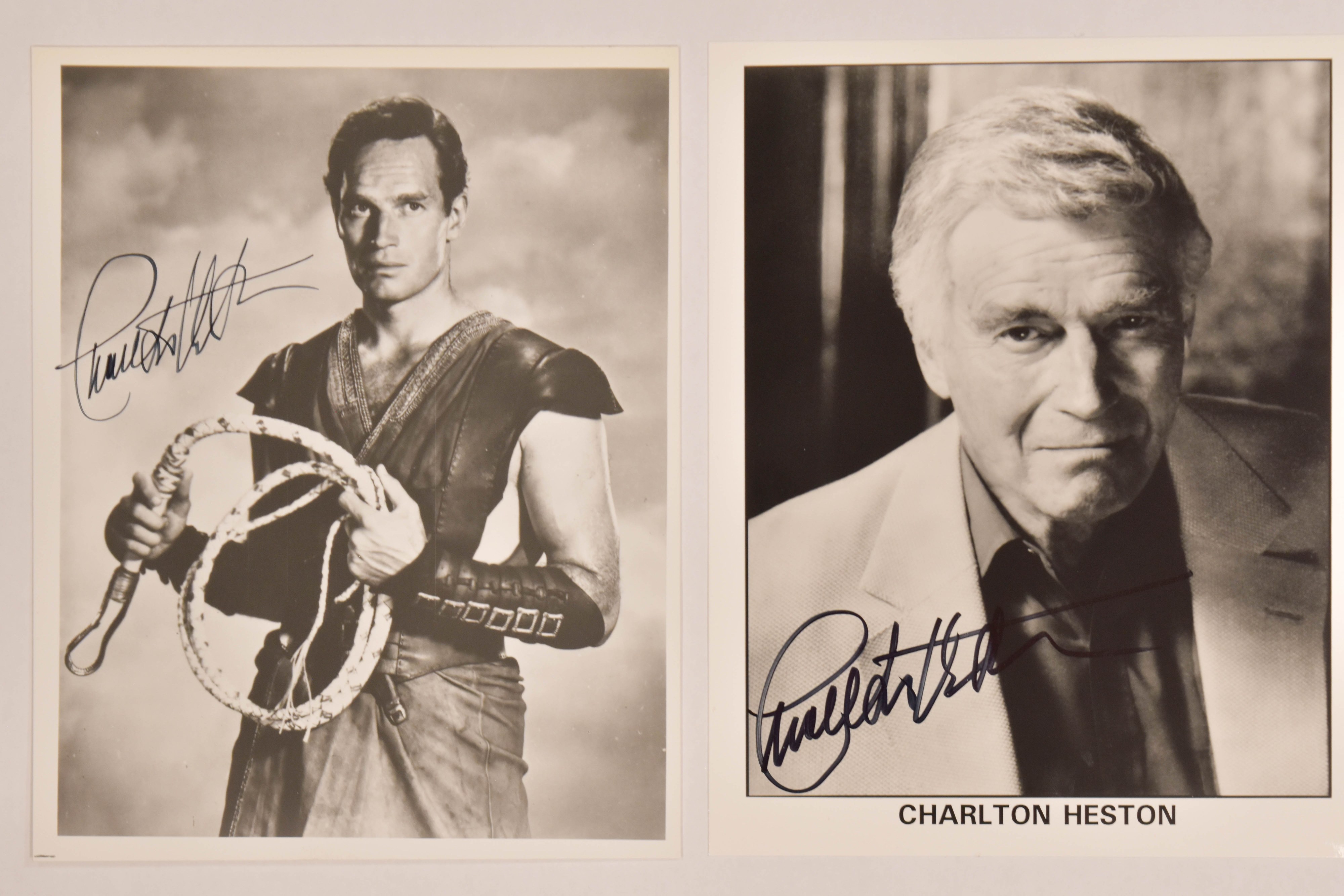 2 Charlton Heston Autographed Black and White Photographs