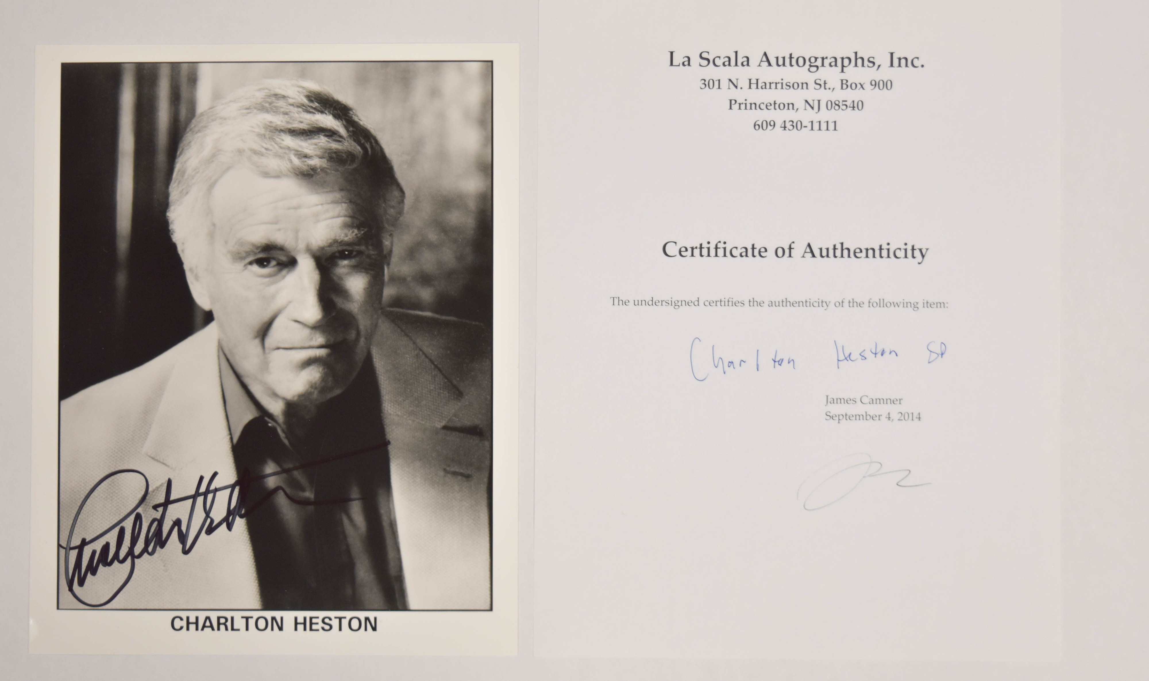2 Charlton Heston Autographed Black and White Photographs