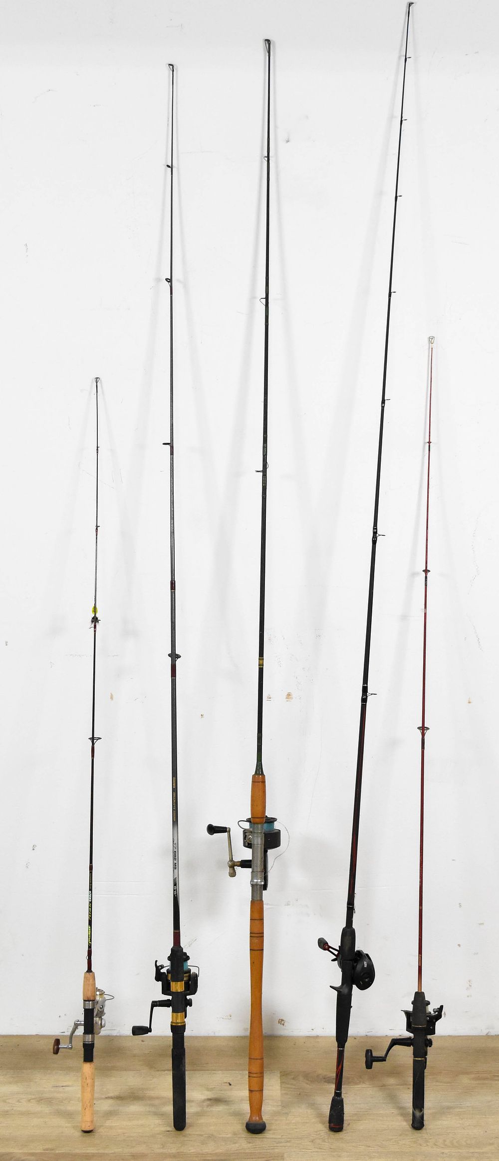 Lot 180: 5 Freshwater Fishing Rods and Reels Including Abu Garcia, Pflueger, and Daiwa