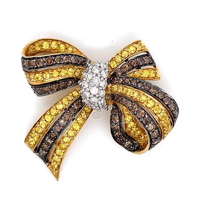 18K Yellow Gold Champagne Diamond & Yellow Sapphire Bow Brooch. Chic 18K yellow gold bow brooch 