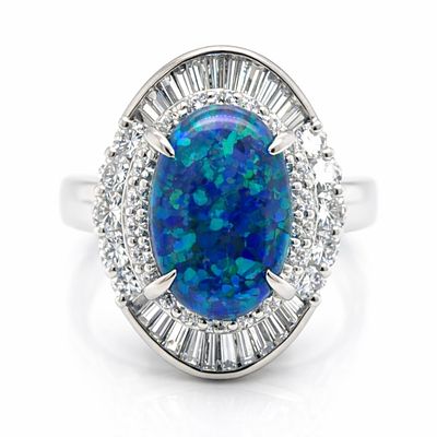 Platinum 2.49 Ct. Opal & Diamond Ring. Platinum ring centering a luminous 2.49 ct opal, framed 