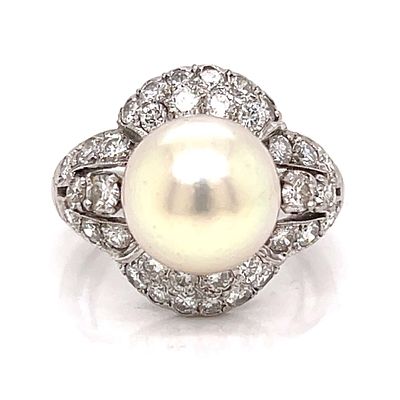 1950’s Platinum Pearl & Diamond Ring. 1950s platinum ring centering a luminous 10.9mm pearl 