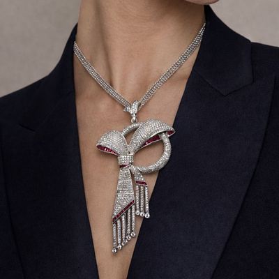 18K White Gold Ruby & Diamond Necklace / Brooch. 18K white gold pendant necklace featuring a 