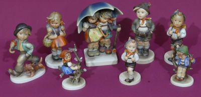 8 various Hummel figures, a couple under umbrella, 15.5cm high etc. (girl in tree - 1 branch 