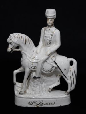 A Victorian china Staffordshire figure on horseback "21st Lancers", 29cm high