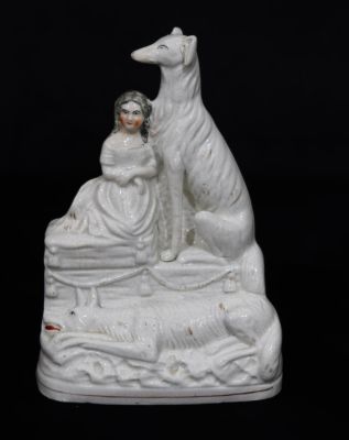 A 19th Century Staffordshire group "Gelert and Prince Llewellyn's Infant son" on white and gilt 
