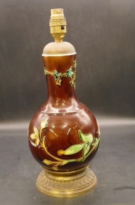 A Majolica style round bulbous thin neck table lamp with gilt metal base (no shade), 36cm high 