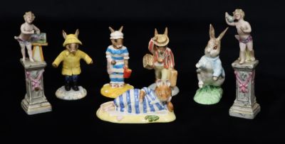 4 Royal Doulton Bunnykins figures "Rainy Day, Mr Salt Apple, Mother Bunnykins and Father 