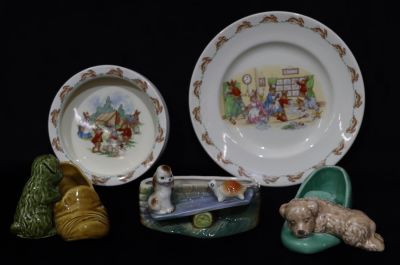 A Royal Doulton Bunnykins baby's bowl, a similar plate, 2 Sylvac vases in the form of puppies 