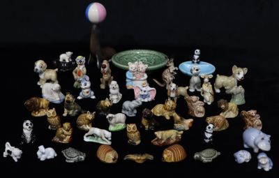 A Wade corkscrew in the form of a seal balancing a ball, 14.5cm high, a quantity of Wade and 