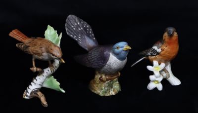 2 Goebel china figures of birds " Nightingale and Chaffinch", 12cm high, a Beswick figure of a 
