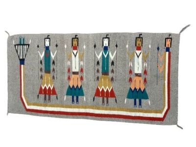 A NAVAJO YEI WEAVING RUG , A TRIBAL handwoven wool flat rug. A wool on wool weaving measuring 